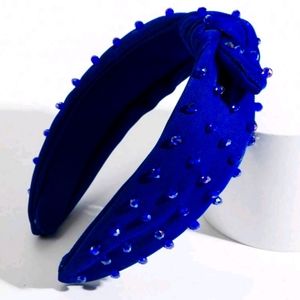 Royal blue headband with stones and knot design